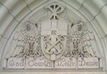 "God, Country, Notre Dame" detail above Basilica door