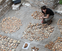 Suzanna Pratt recording the pottery finds at Butrint, Albania