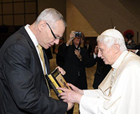 John Cavadini presents Pope Benedict XVI with a festschrift from the University of Notre Dame