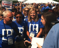 Patricia Harte, far right, interviews realtors at the "Rally for the American Dream" in front of the Washington Monument