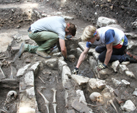 Arts and Letters students Michael Kipp and Mattimore Cooper excavating burials at the Butrint World Heritage Site in Albania