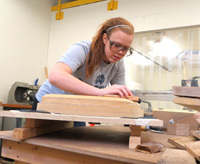 A student in the Reilly Arts and Letters/Engineering Dual Degree Program, notre Dame senior Breanna Stachowski works on a prototype of her design