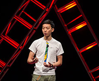 Peter Woo speaks at the 2014 TEDxUND event