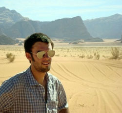 Glen Water standing in desert
