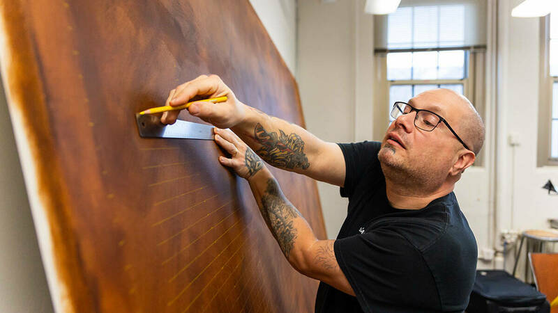 IRR artist-in-residence David Martin begins a mural project.