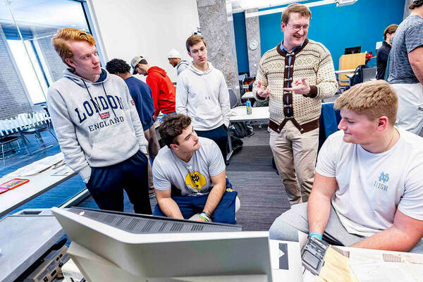 Dan Johnson works with students using pieces from the legacy technology collection.